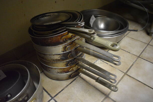 10 Various Metal Items; 4 Skillets and  6 Shallow Sauce Pans. Includes 22x12x2.5. 10 Times Your Bid! (dishwasher area)