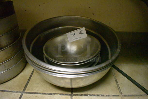 9 Various Metal Bowls. Includes 16x16x6. 9 Times Your Bid! (dishwasher area)
