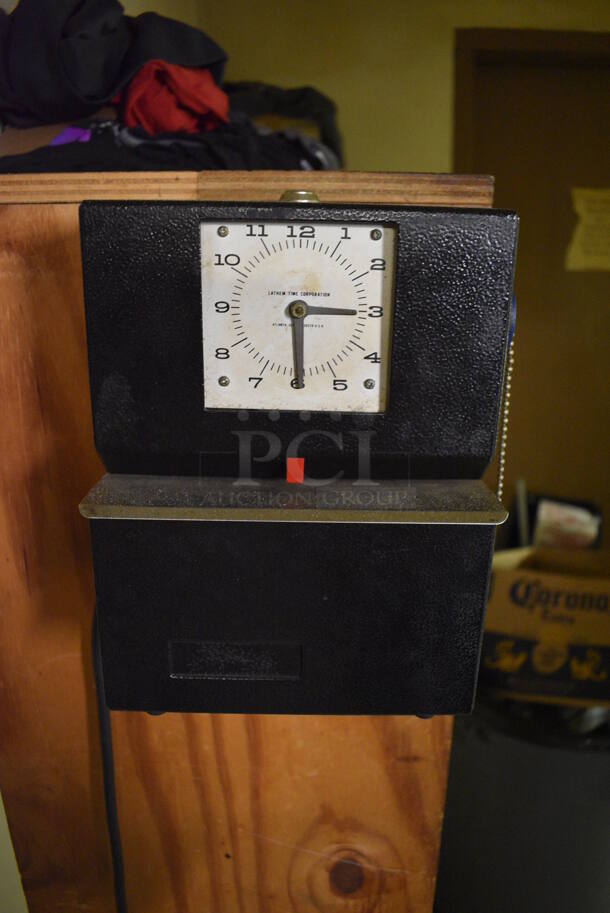 Lathem Metal Commercial Time Clock and 2 Metal Time Card Holders. BUYER MUST REMOVE. 7.5x5.5x10, 4.5x1x37. (dishwasher area) - Image 2 of 7