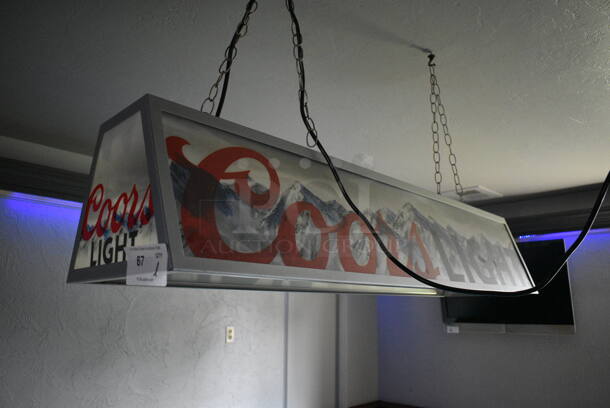 Coors Light Metal Light Fixture. Item Was in Working Condition on Last Day of Business. BUYER MUST REMOVE. 48x15x11. (bar)