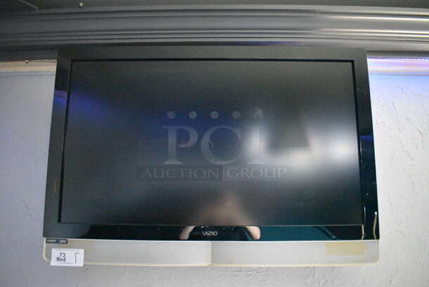 Vizio 42" Television w/ Mount. BUYER MUST REMOVE. Item Was in Working Condition on Last Day of Business. Buyer Must Pick Up - We Will Not Ship This Item. (bar) - Image 1 of 6