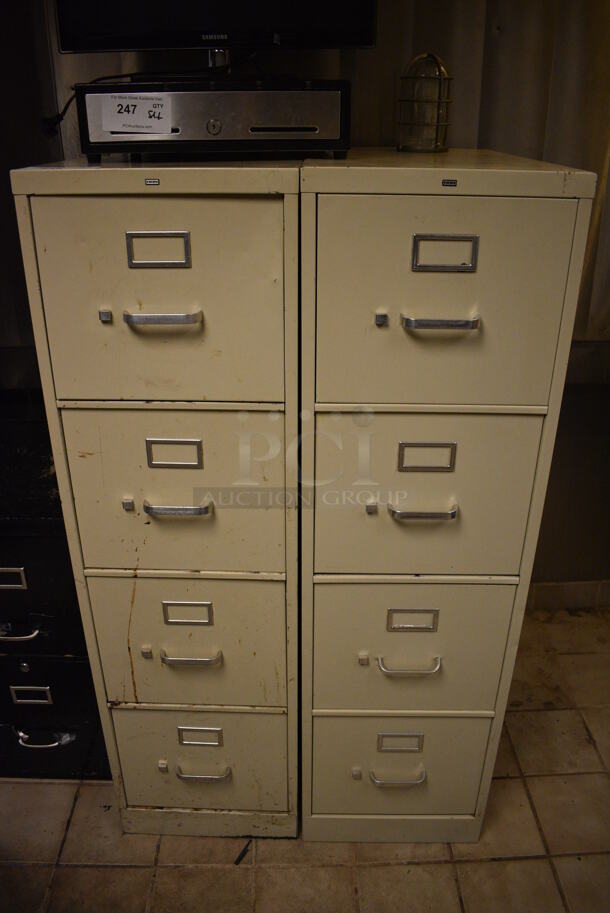 2 Tan Metal 4 Drawer Filing Cabinets. Does Not Include Contents. BUYER MUST REMOVE. 15x27x52. 2 Times Your Bid! (office)