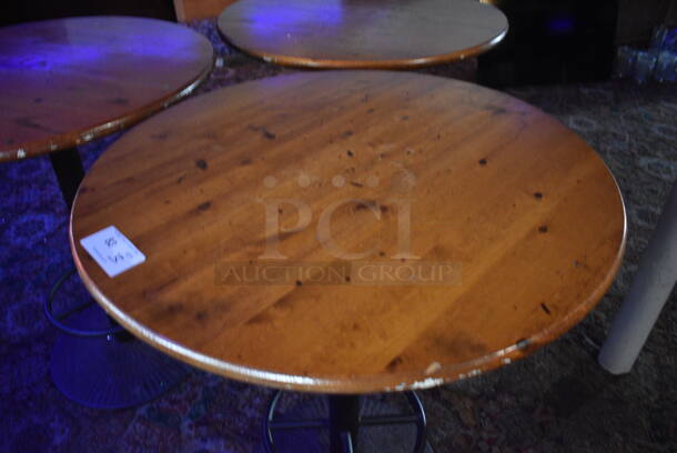 3 Round Wood Pattern Bar Height Tables on Metal Table Base. 36x36x42. 3 Times Your Bid! (bar) - Image 3 of 6