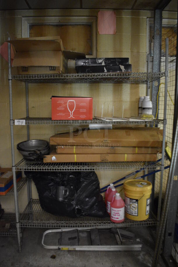 ALL ONE MONEY! Lot of Metal 4 Tier Shelving Unit w/ Contents Including Foaming Hand Soap Jugs and Glassware. BUYER MUST DISMANTLE. PCI CANNOT DISMANTLE FOR SHIPPING. PLEASE CONSIDER FREIGHT CHARGES. 54x18x35. BUYER MUST REMOVE. (basement) - Image 1 of 5