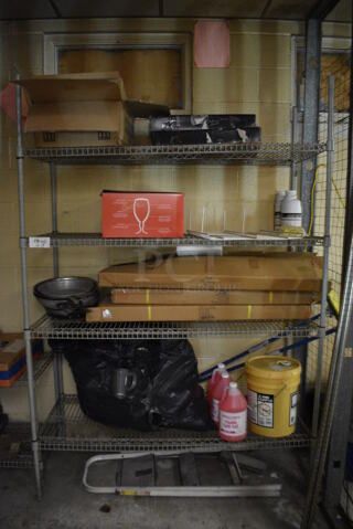 ALL ONE MONEY! Lot of Metal 4 Tier Shelving Unit w/ Contents Including Foaming Hand Soap Jugs and Glassware. BUYER MUST DISMANTLE. PCI CANNOT DISMANTLE FOR SHIPPING. PLEASE CONSIDER FREIGHT CHARGES. 54x18x35. BUYER MUST REMOVE. (basement)