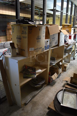 ALL ONE MONEY! Lot of 3 Wooden Shelving Units w/ Contents Including Metal Pans, Paper Products and Colander. BUYER MUST DISMANTLE. PCI CANNOT DISMANTLE FOR SHIPPING. PLEASE CONSIDER FREIGHT CHARGES. 38x16x38.5. BUYER MUST REMOVE. (basement)