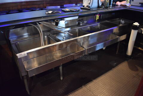 Stainless Steel 3 Bay Sink w/ Drain Board, 2 Ice Bins and 3 Speedwells. BUYER MUST REMOVE. 108x28x34. Bays 10x14x10. Drain Board 12x16x1. Ice Bins 20x15x8. (bar)