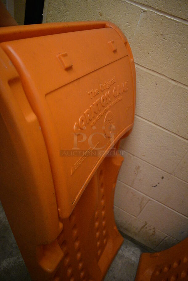 2 The Original Corntoss Game Orange Poly Corn Hole Boards. 24x6x49. 2 Times Your Bid! (basement) - Image 3 of 4