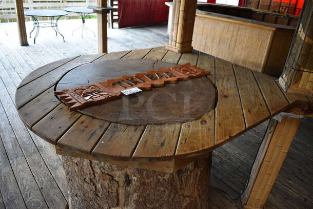 Wooden Tiki Bar Sign. Buyer Can Also Take Wooden Tabletop Around Stump If They Want To; That Is BUYER MUST REMOVE. 40x1x7.5, 50x63. (patio) - Image 3 of 6