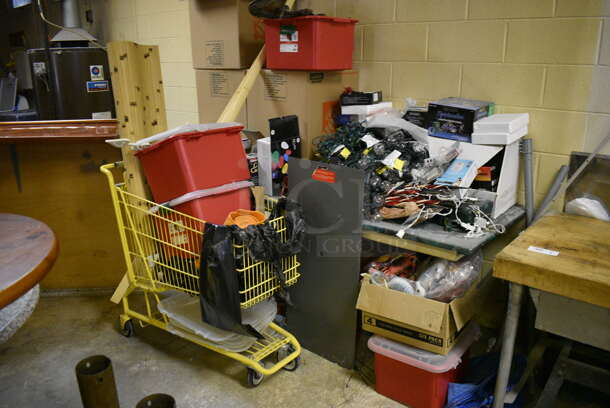 ALL ONE MONEY! Lot of Table, Shopping Cart and Contents of Various Decorations Including Christmas Lights. BUYER MUST REMOVE. Includes 77x30x30. (basement) - Image 1 of 7
