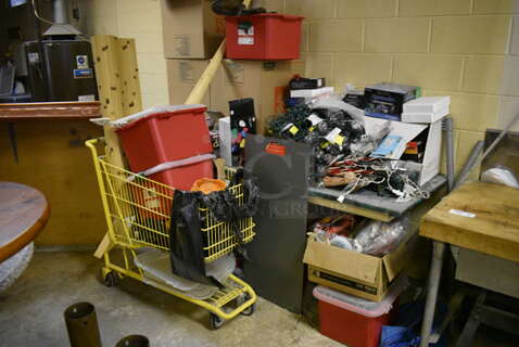 ALL ONE MONEY! Lot of Table, Shopping Cart and Contents of Various Decorations Including Christmas Lights. BUYER MUST REMOVE. Includes 77x30x30. (basement)