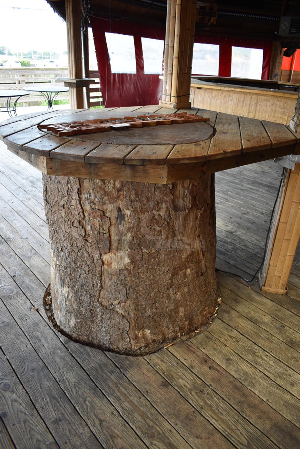 Wooden Tiki Bar Sign. Buyer Can Also Take Wooden Tabletop Around Stump If They Want To; That Is BUYER MUST REMOVE. 40x1x7.5, 50x63. (patio) - Image 4 of 6