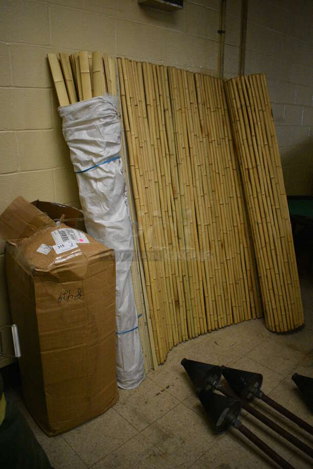 ALL ONE MONEY! Lot of Fake Wood Patterned Bamboo Sheet and Fronds. BUYER MUST REMOVE. (basement)