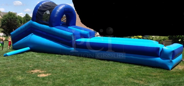 Commercial Inflatable Slide w/ Blower and Trailer. (basement)
