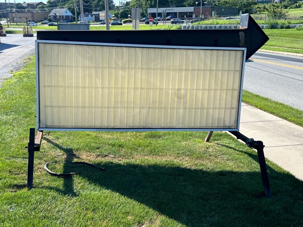 Metal Outdoor 9'x4' Double Sided Light Up Message Center on Adjustable Legs. Needs Bulbs. BUYER MUST REMOVE. This Item Is Located At Another Site and Address Will Be Given To Winning Bidder After Invoice Payment. - Image 1 of 3