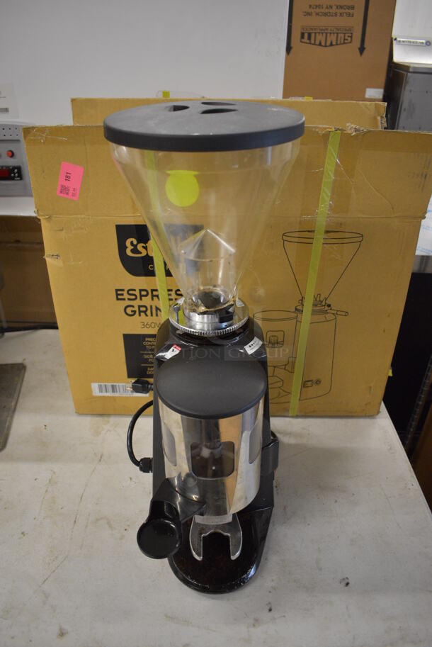 IN ORIGINAL BOX! Estella 236ECEG26 Metal Commercial Countertop Espresso Bean Grinder w/ Hopper. 110/120 volts, 1 Phase. 6x14x26. Tested and Powers On But Parts Do Not Move