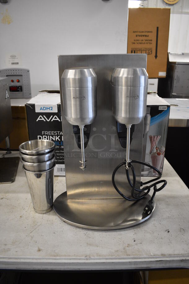 BRAND NEW IN BOX! Avamix DM-B-21C Stainless Steel Commercial Countertop 2 Head Drink Mixer w/ 4 Mixing Cups. 110-120 Volts, 1 Phase. 16x12x22. Tested and Working!