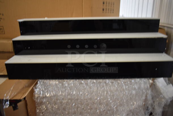 BRAND NEW IN BOX! Black and Clear Poly 3 Tier Bottle Rack. 36x13x12