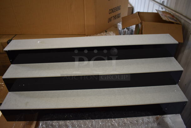 BRAND NEW IN BOX! Black and Clear Poly 3 Tier Bottle Rack. 36x13x12 - Image 2 of 5
