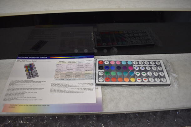 BRAND NEW IN BOX! Black and Clear Poly 3 Tier Bottle Rack. 36x13x12 - Image 4 of 5