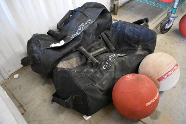 2 CFF Fit Black Bags w/ Two 25 Lb Medicine Ball. 30x12x12. 2 Times Your Bid! - Image 12 of 12