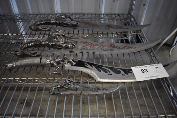4 Various Trophy Knives w/ Dragon Handle. Includes 21.5x1x6. 4 Times Your Bid! - Image 1 of 8