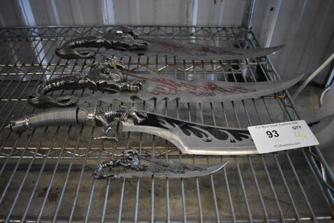 4 Various Trophy Knives w/ Dragon Handle. Includes 21.5x1x6. 4 Times Your Bid!