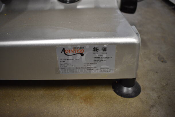 BRAND NEW IN BOX! Avantco 177SL312 Stainless Steel Commercial Countertop Meat Slicer w/ Blade Sharpener. 120 Volts, 1 Phase. 26x20x20. Tested and Working! - Image 5 of 7
