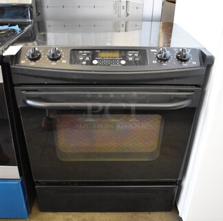 General Electric Model JSP42BOK3BB Metal Electric Powered 4 Burner Range w/ Oven. 208 Volts, 1 Phase. 32x27x35.5
