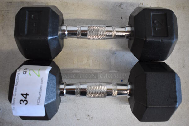 2 Black and Chrome Metal 12 Pound Hex Dumbbells. 11.5x4.5x3.5. 2 Times Your Bid! - Image 1 of 4