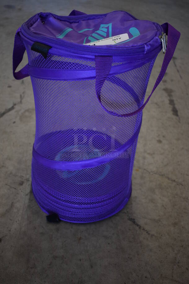 16 Floor Gliding Purple Discs in Purple Mesh Bin. 10x10x15