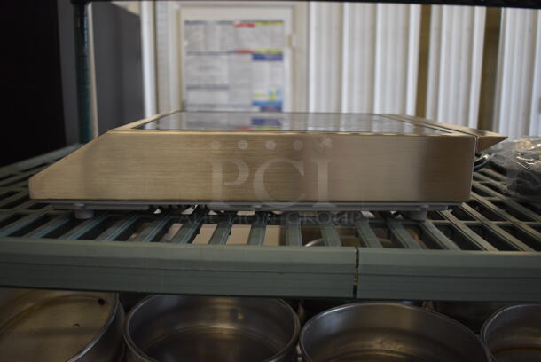 BRAND NEW! 2022 Vollrath Model 59300 Stainless Steel Commercial Countertop Electric Powered Single Burner Induction Range. 120 Volts, 1 Phase. 12x16x4 - Image 3 of 5