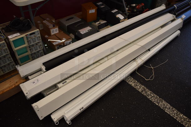 13 Various Pull Down Projector Screens Including Da-lite. Includes 99