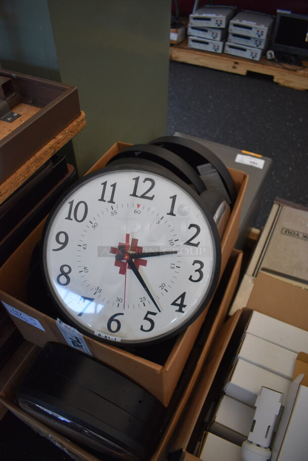 ALL ONE MONEY! Lot of 2 Boxes of PrimeX Clocks w/ HACC Logo. These clocks have the ability to be hooked up to an atomic clock in Colorado if you pay for a subscription, get a receiver and GPS antenna. If you don't do that, you can press the red button and that changes the clock to being battery powered. Approximately 20 Clocks. 12.5x2.5x12.5 - Image 3 of 8