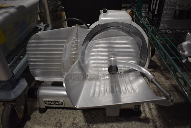 Waring Metal Commercial Countertop Meat Slicer w/ Blade Sharpener. 19x17x15. Tested and Powers On But Parts Do Not Move