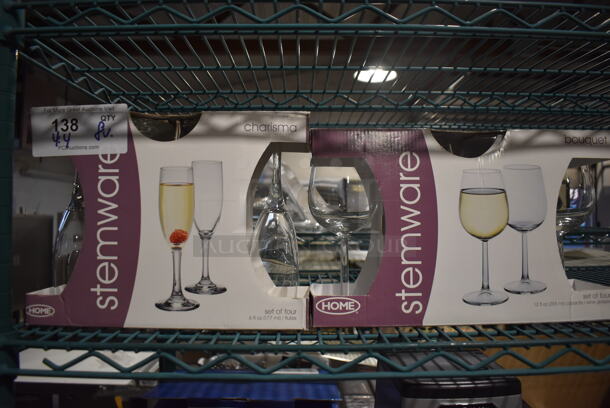 ALL ONE MONEY! Lot of 8 BRAND NEW! Stemware; 4 Bouquet Wine Glasses and 4 Charisma Champagne Glasses. 2x2x8, 3x3x7.5