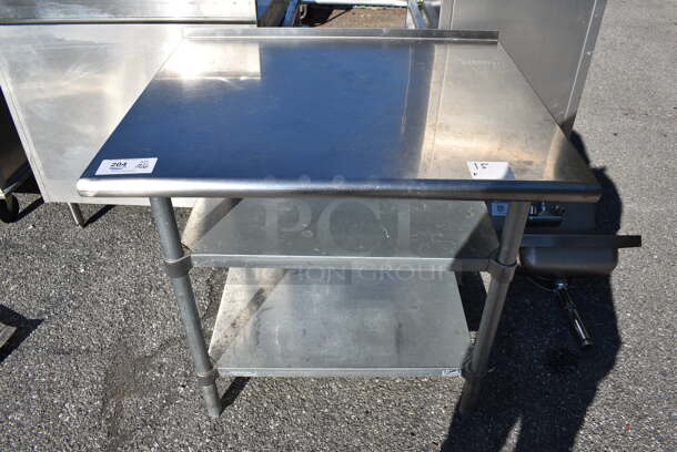 Stainless Steel Commercial Table w/ 2 Metal Under Shelves. 36x30x35