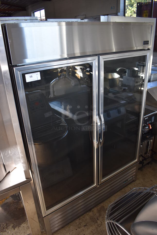 2019 True GDM-49-HC~TSL01 Stainless Steel Commercial 2 Door Reach In Cooler Merchandiser w/ Poly Coated Racks. 115 Volts, 1 Phase. 54x32x79. Tested and Working!