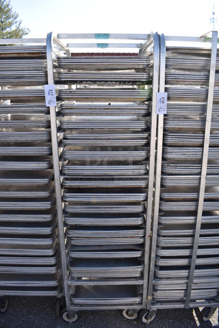 Metal Commercial Pan Transport Rack w/ 72 Full Size Metal Baking Pans on Commercial Casters. 20.5x26x70. 18x26x1