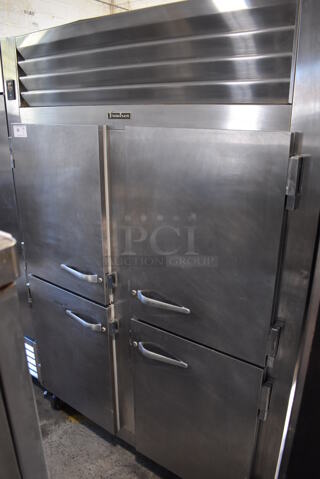 Traulsen RHT232WUT-HHS ENERGY STAR Stainless Steel Commercial 4 Half Size Reach In Cooler on Commercial Casters. 115 Volts, 1 Phase. 58x33x83. Tested and Working!