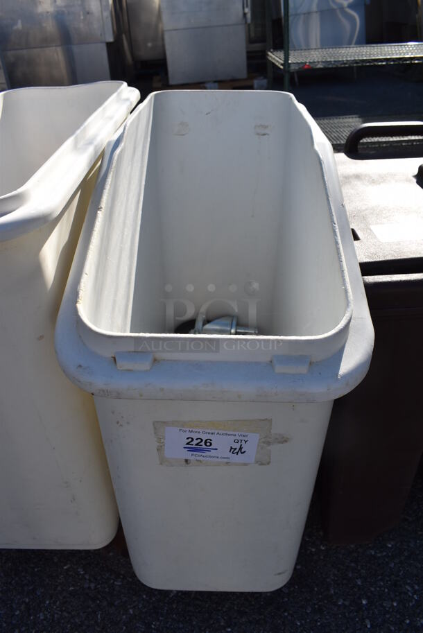 White Poly Ingredient Bin on Commercial Casters. Comes w/ 4 Extra Casters. 13x30x29