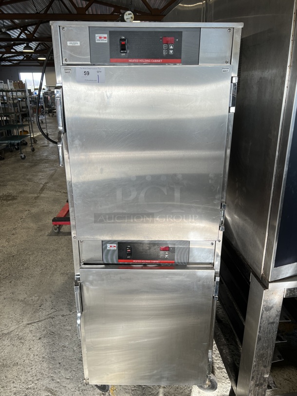 Carter Hoffmann HBU12 Stainless Steel Commercial Heated Holding Cabinet on Commercial Casters. 120 Volts, 1 Phase. 26.5x33x79. Tested and Working!