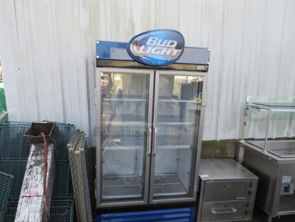 One Fogel 2 Door Bud Light Glass Door Merchandising Refrigerator With 8 Racks. Model# FROSTER-30-PVPH-US. 115 Volt. 43X26X84