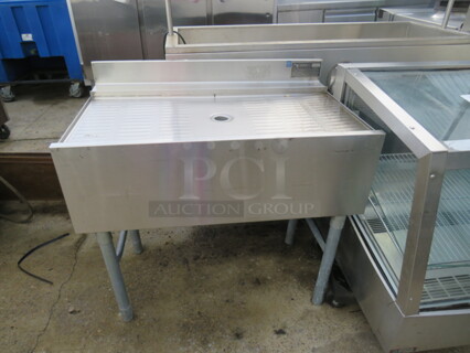 One Stainless Steel Eagle Under Bar Drain Table, With Back Splash. 36X22X34