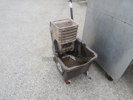One Rubbermaid Mop Bucket And Wringer.