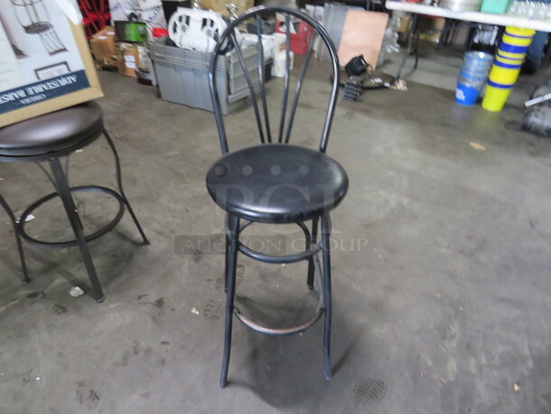 Black Metal Bar Height Chair With Black Cushioned Seat And Footrest. 2XBID