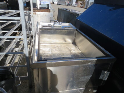 One Stainless Steel Bar Center With An Ice Well With Cold Plate And Hand Sink With Faucet.