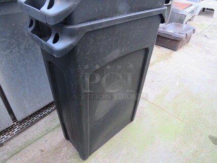One Slim Jim Trash Can.