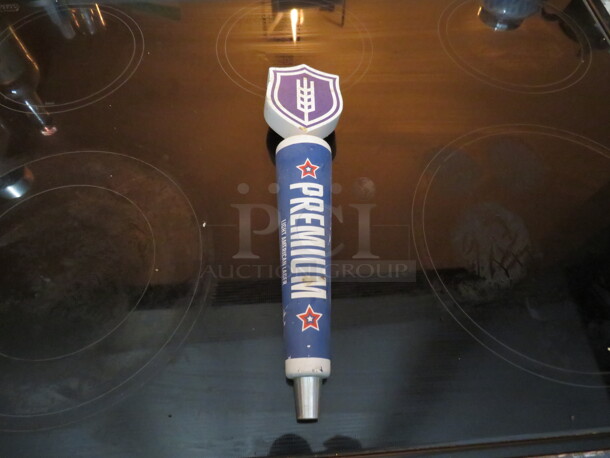 One Beer Tap Handle.
