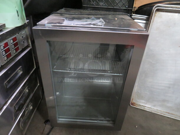 One Stainless Steel Red Bull Glass Door Counter top Cooler With 1 Rack. Model# MED. 110-120 Volt. 16X17.5X23